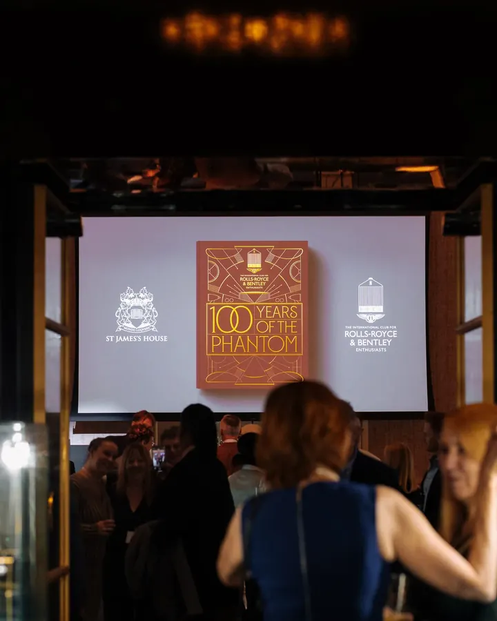 Guests watching the presentation at the 100 Years of the Phantom event