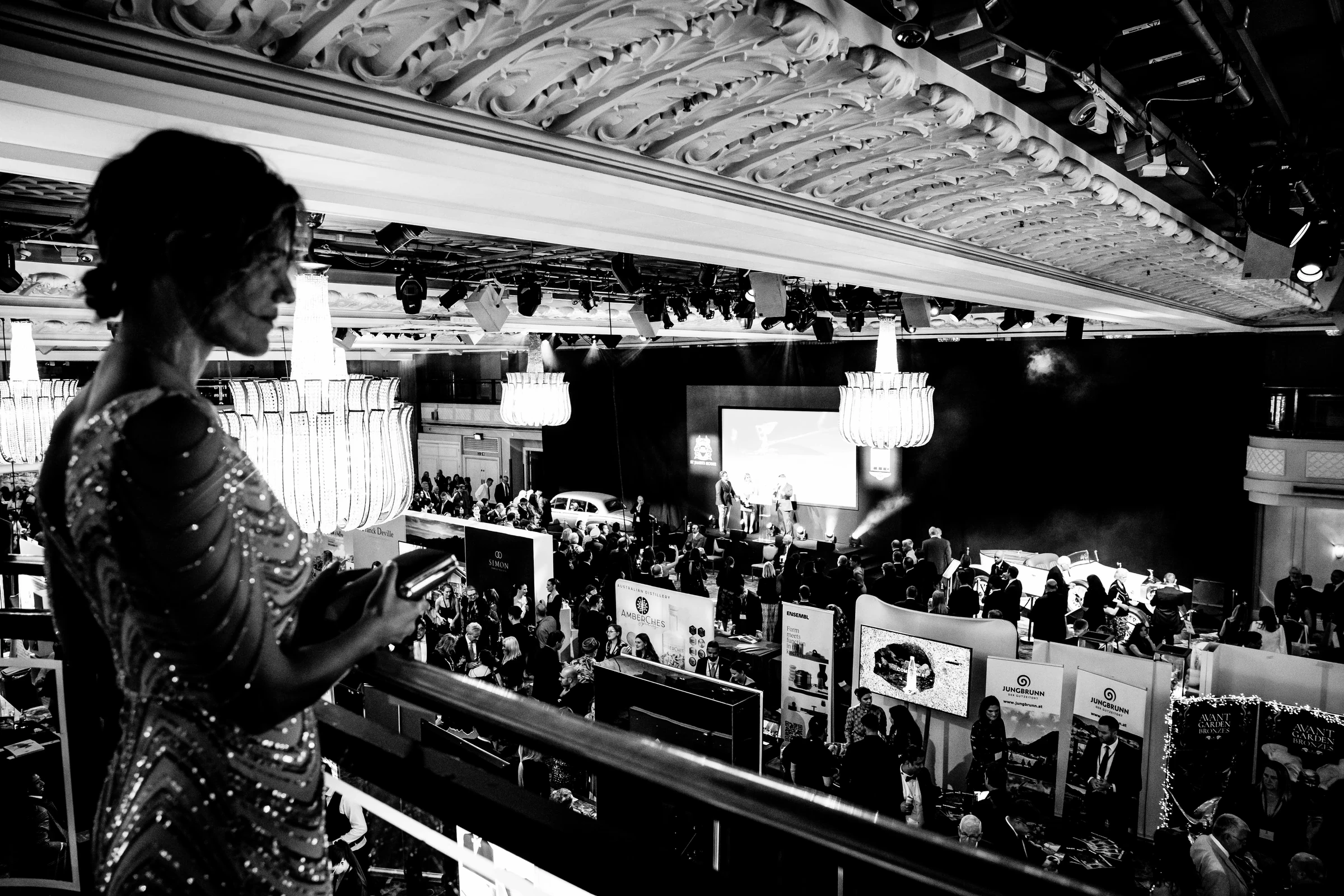 A musician and guests in the Great Room at Grosvenor House