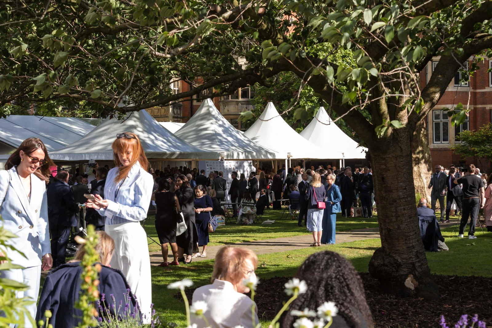 Conversation on the lawn at the Monarchy and Democracy launch