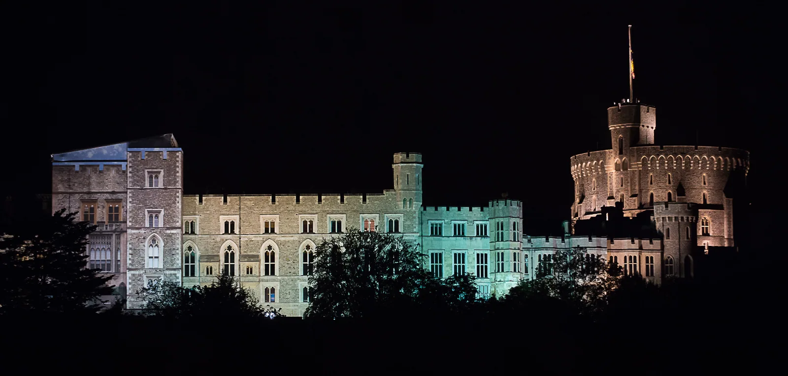 An illuminated venue after dark
