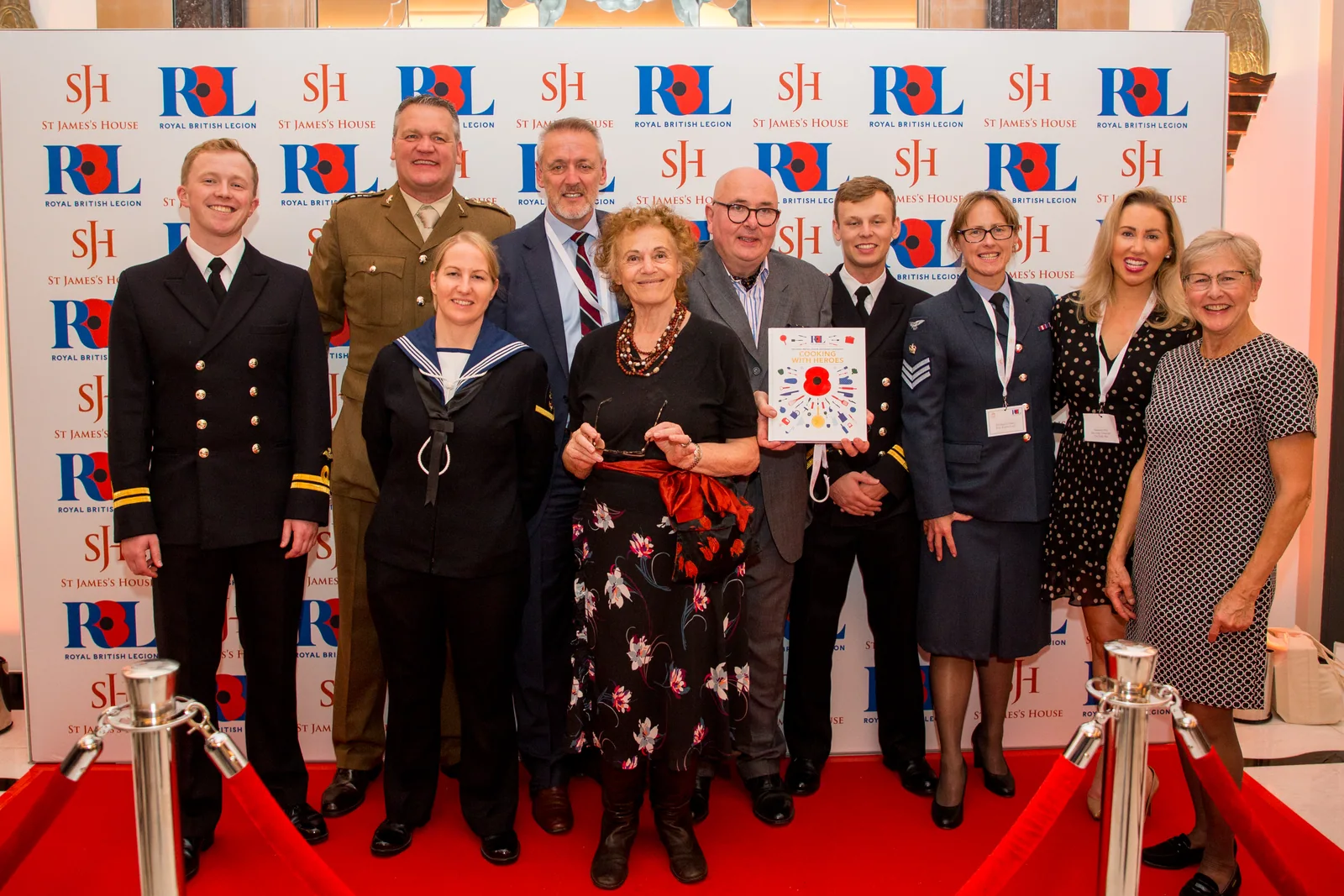 Guests posing together at a publication launch