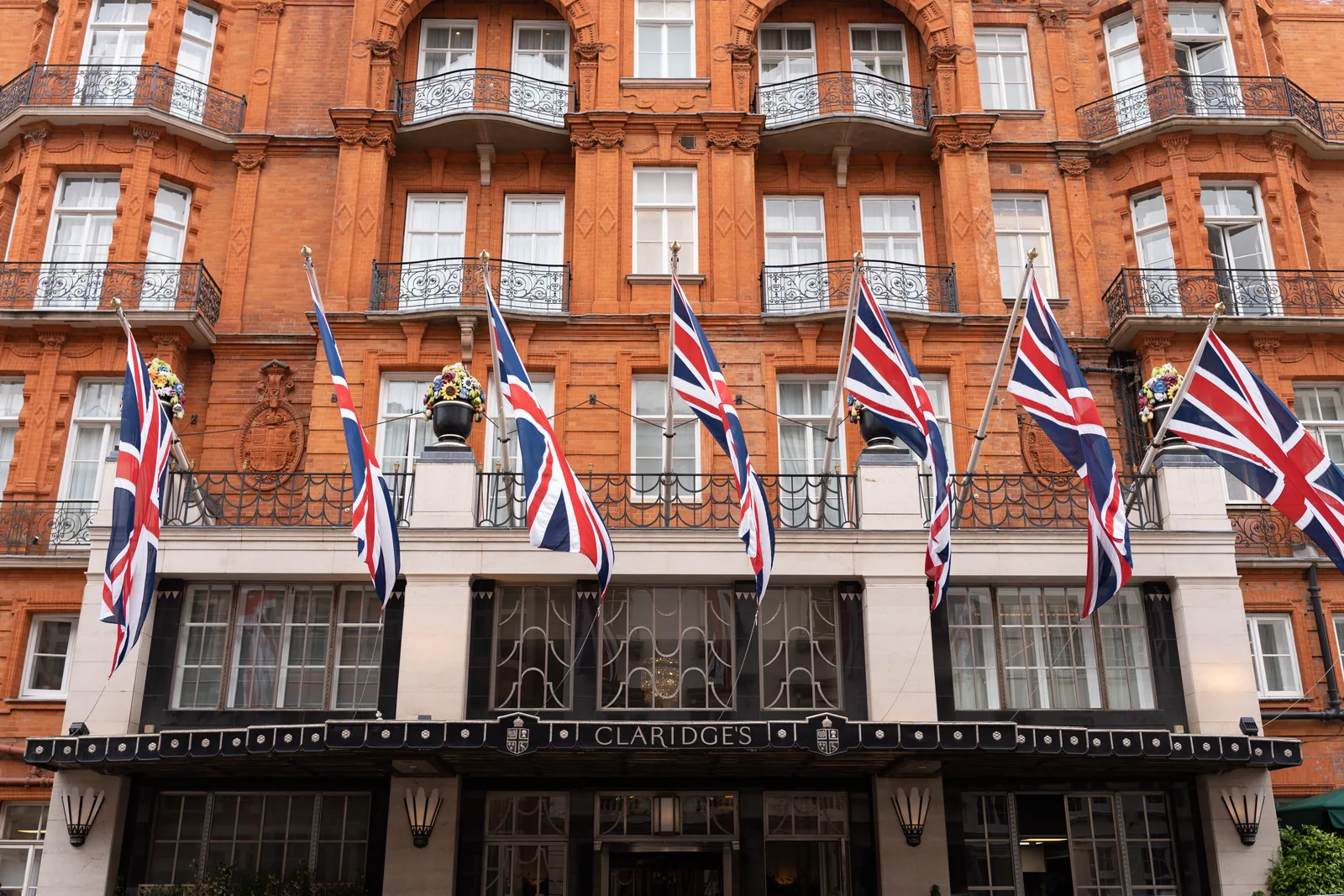 A London venue entrance decorated with flags