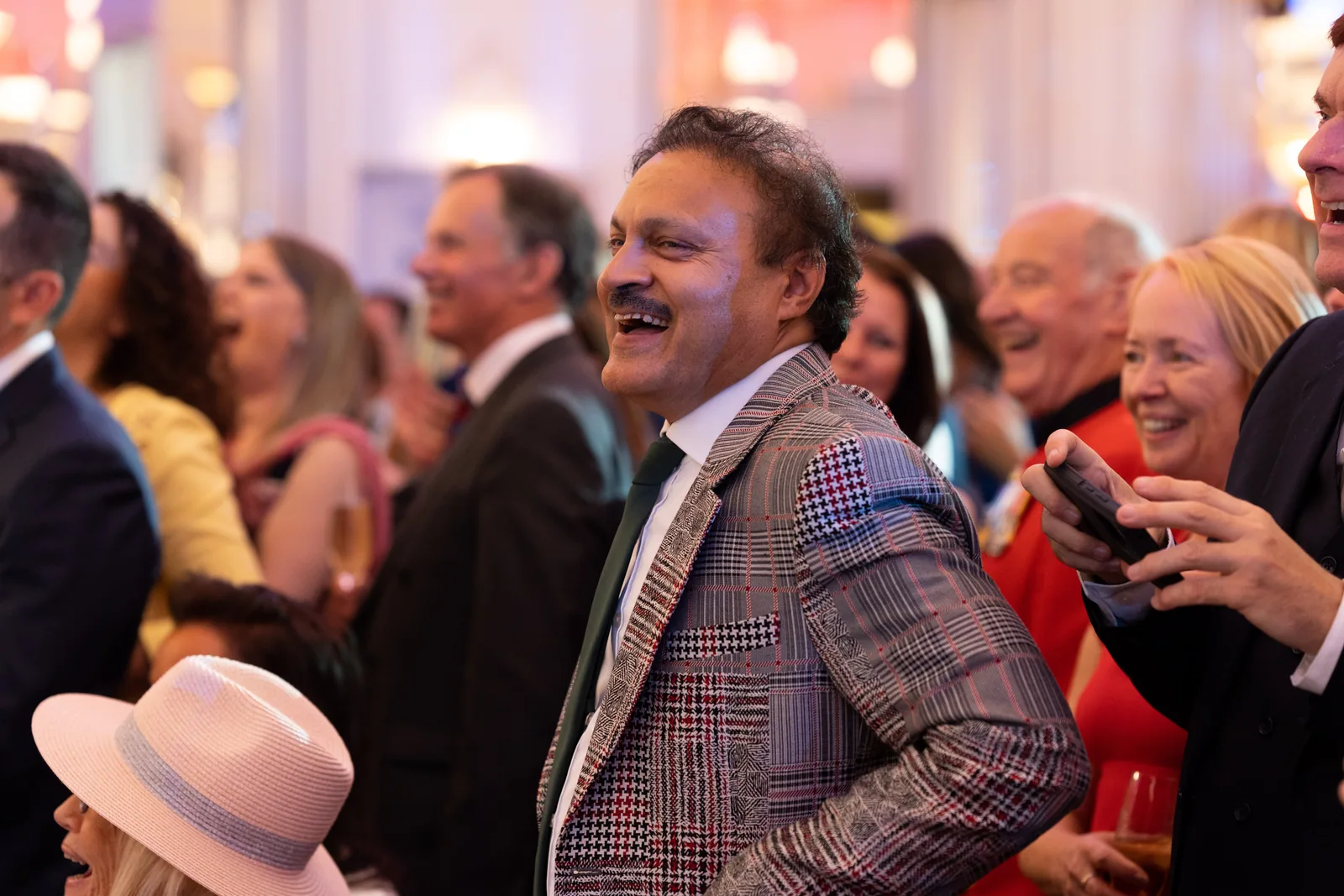 Smiles and applause from an engaged audience