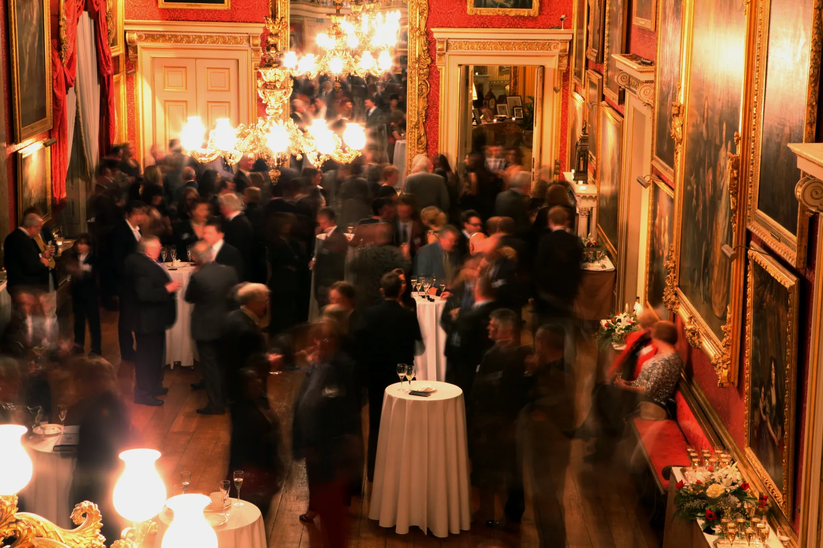 A candlelit gathering in an elegant venue
